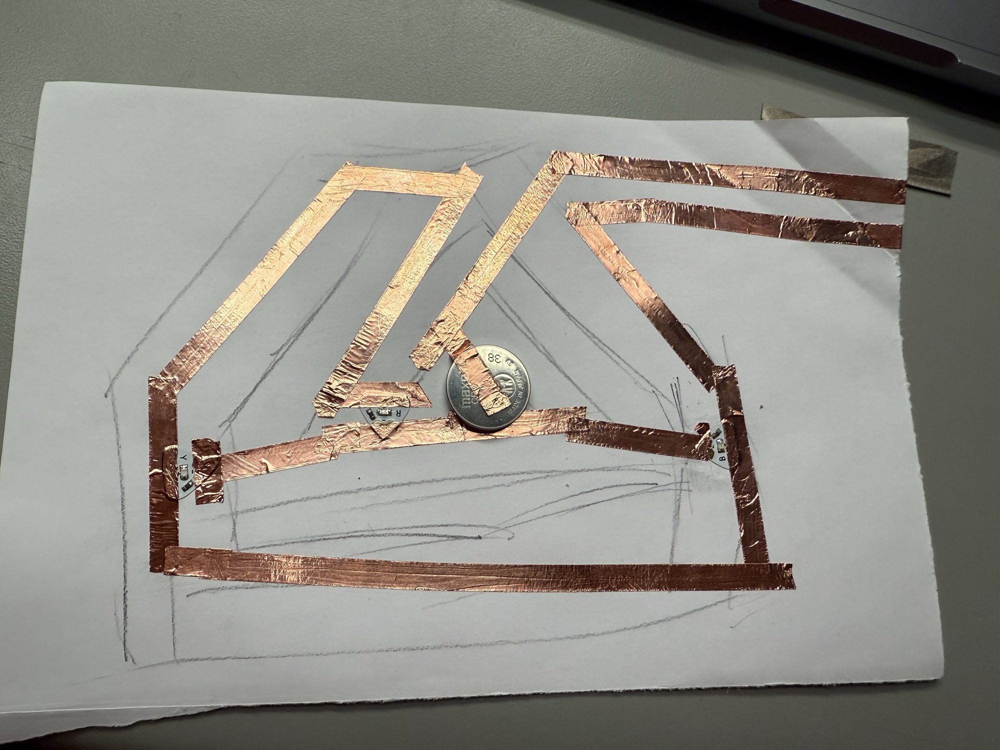 Example of a completed circuit using copper tape and basic electronics.