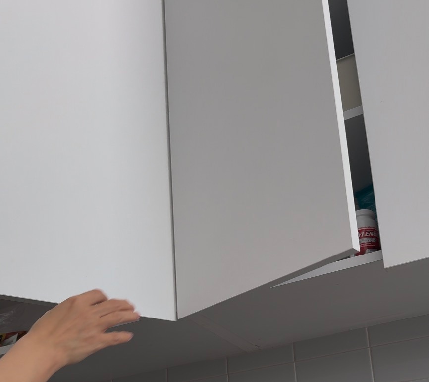 Close the cabinet door